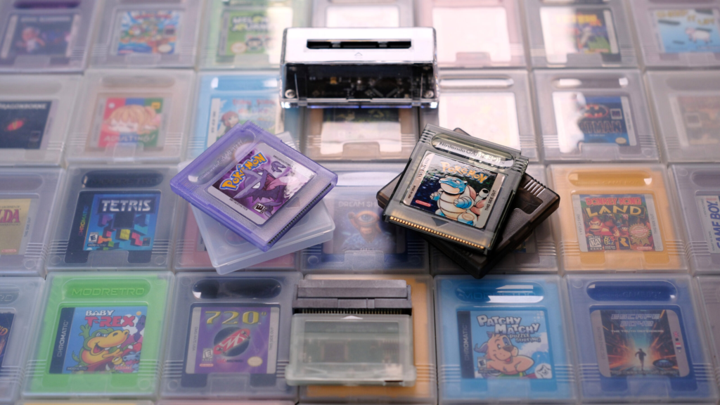 Custom Game Boy carts with GB Operator and GBxCart RW on top of Game Boy games