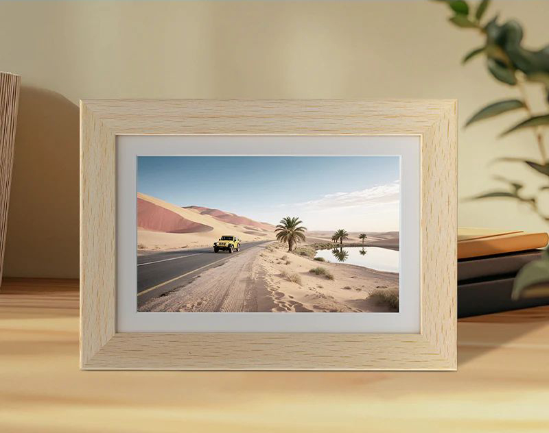 Bigme F7 on a table showing a desert scene