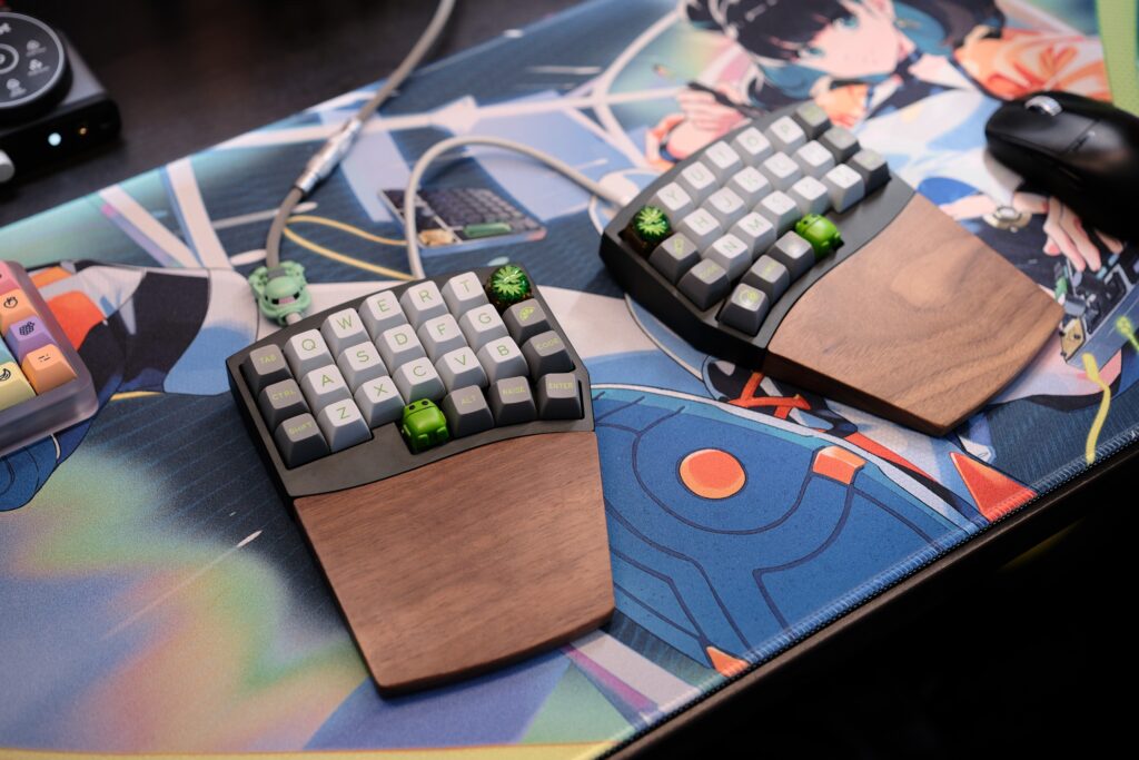 Photo of Altair-X keyboard from a slight angle sitting on deskmat