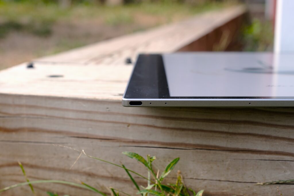 Boox Tab X C laying on wood showing USB-C port