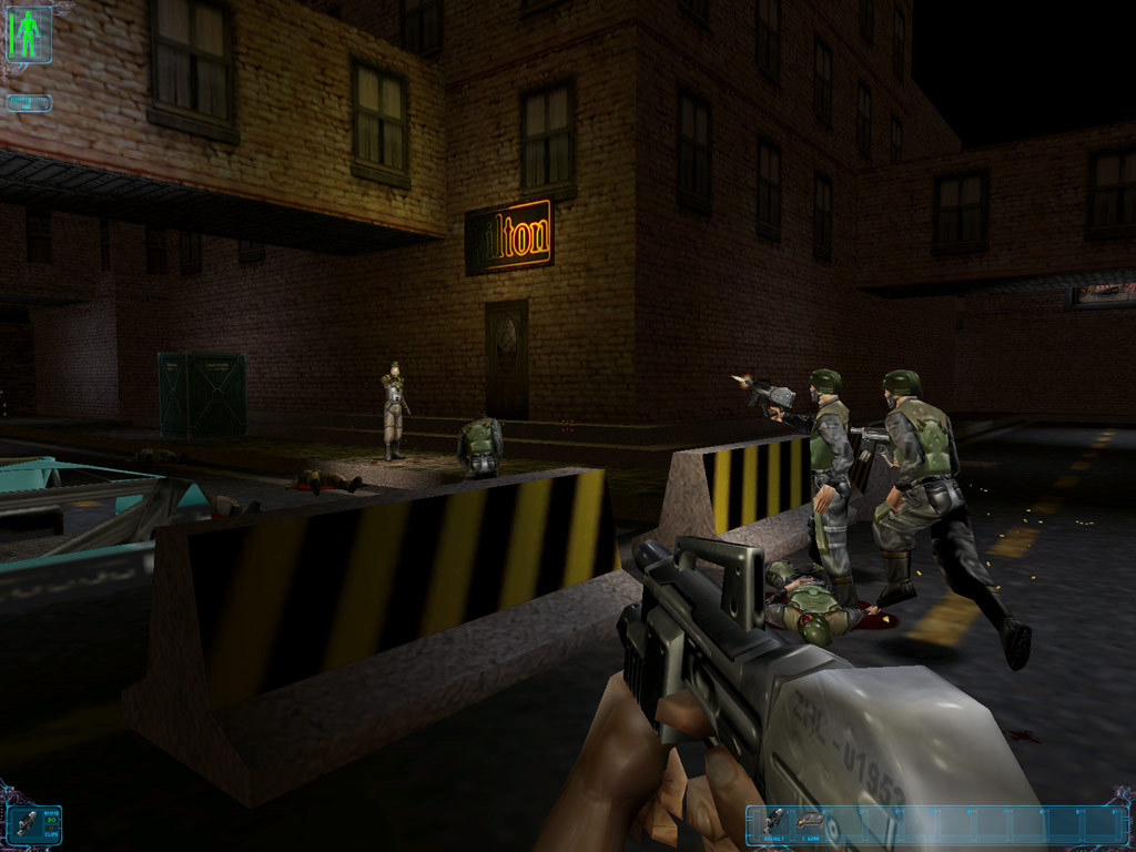 Deus Ex: Game of the Year Edition screenshot showing player shooting at enemies