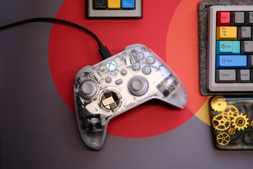 Photo of Xbox controller on colorful deskmat