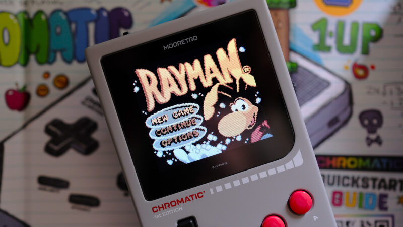 Rayman game playing on Chromatic screen while laying on Chromatic box