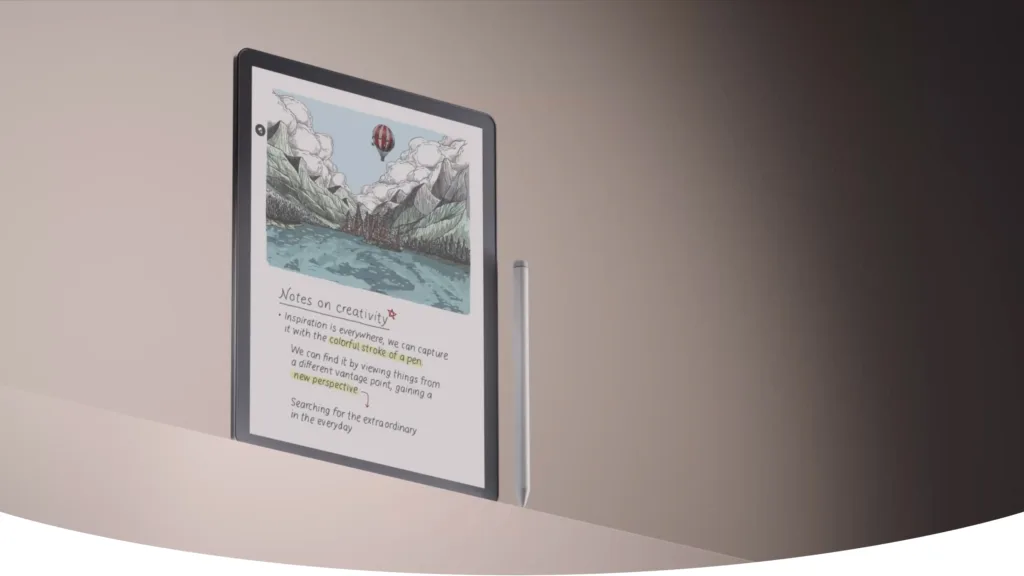 Kindle Scribe Colorsoft standing on ledge with pen