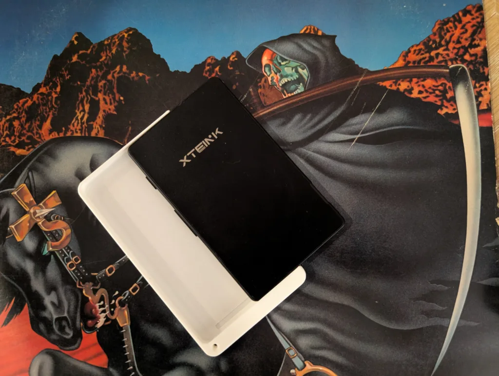 Xteink X4 in 3D-printed case with its face down