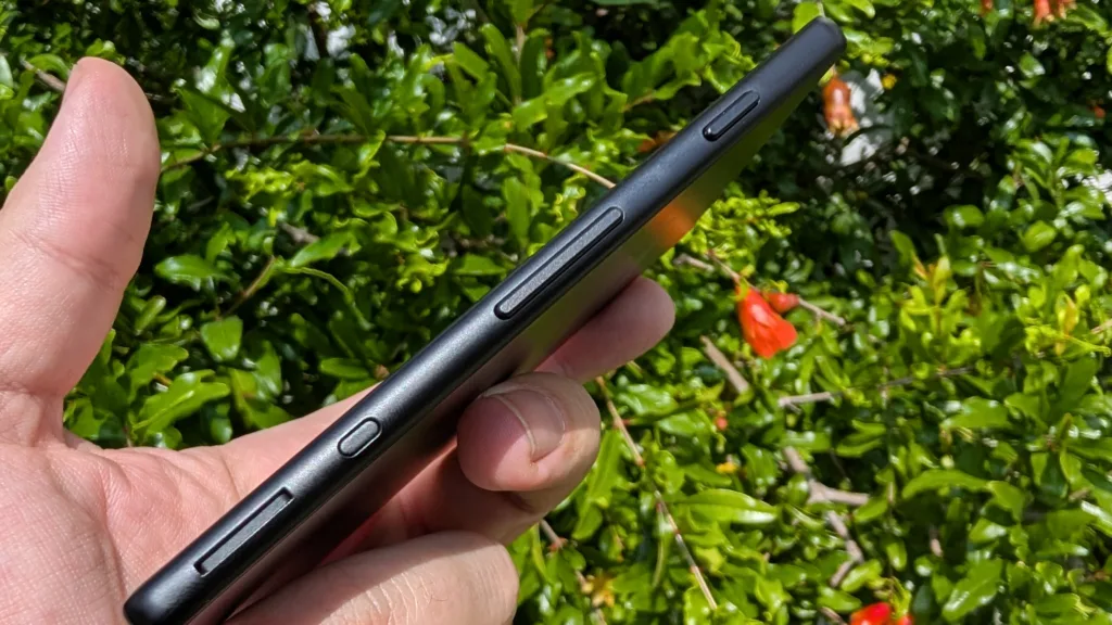 Xteink X4 in hand showing side buttons