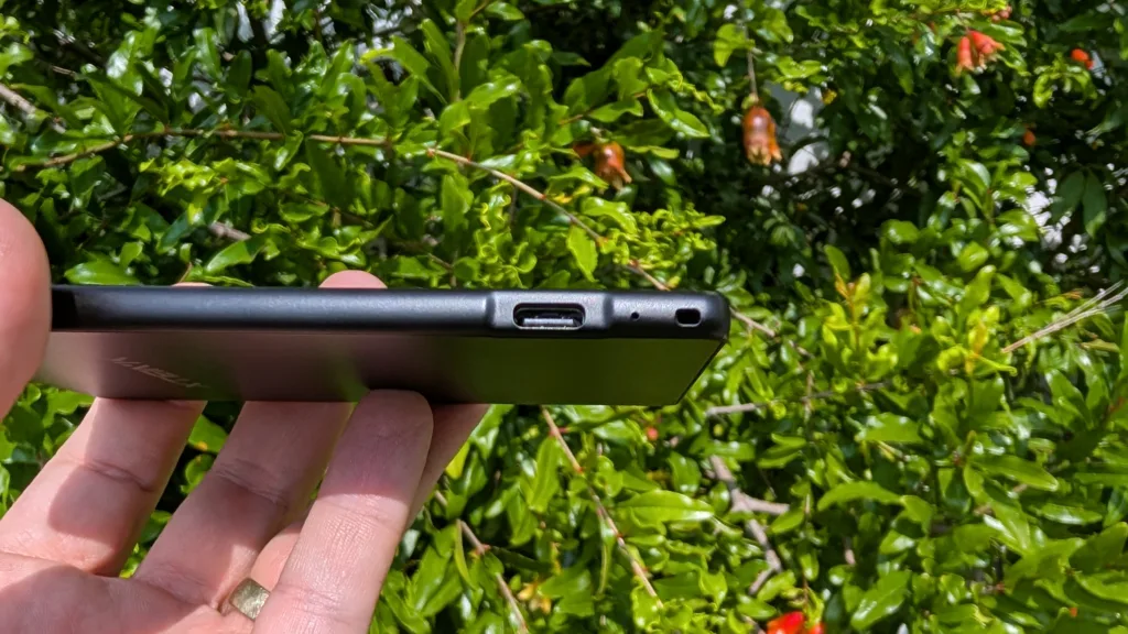 Xteink X4 in hand showing USB-C port