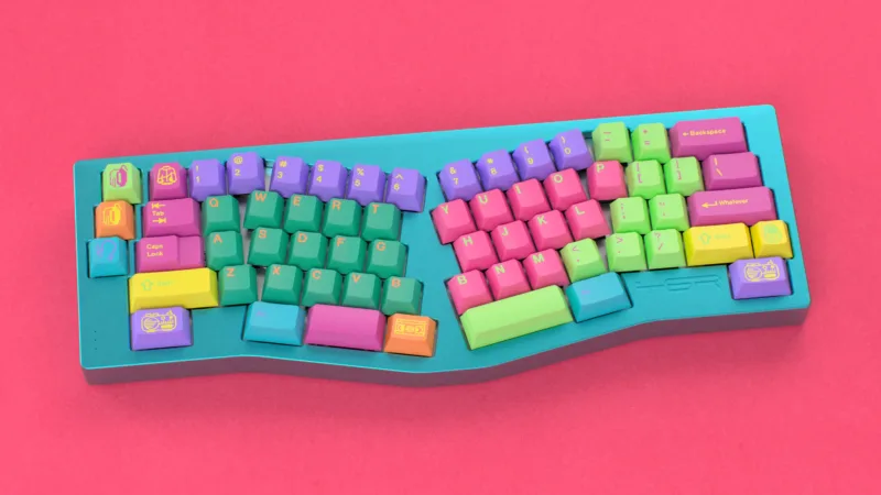 GMK Windbreaker on Alice keyboard with pink background
