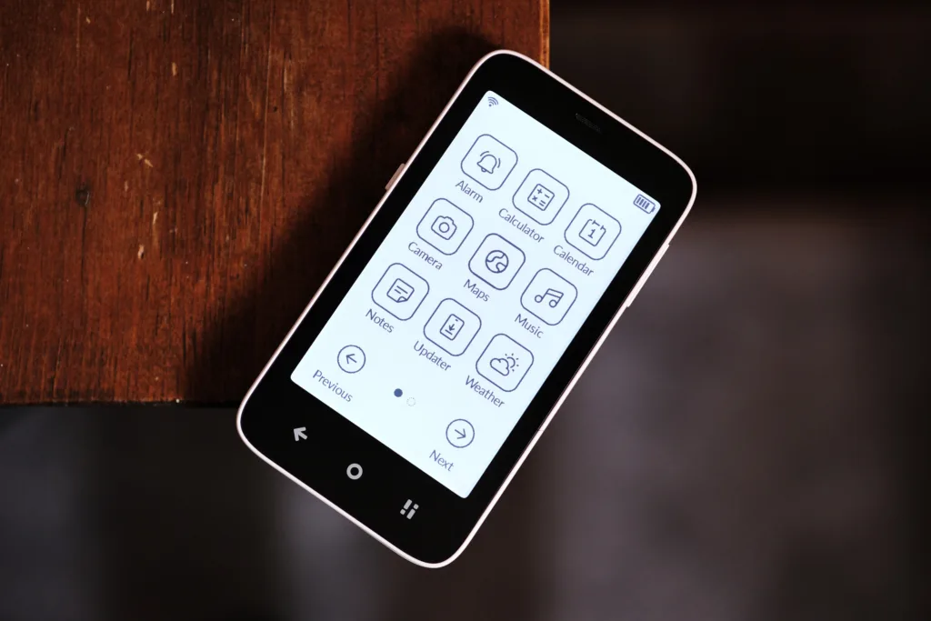 Mudita Kompakt on edge of banister