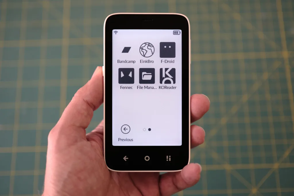 Mudita Kompakt held in hand to show small sizw