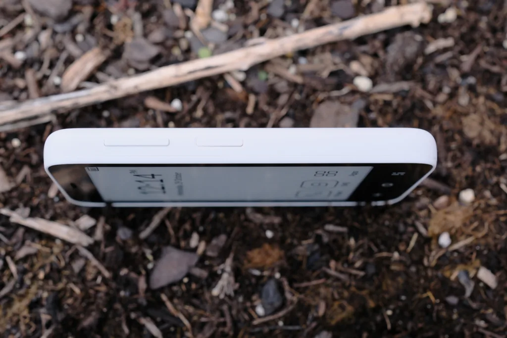 Mudita Kompakt volume and power buttons