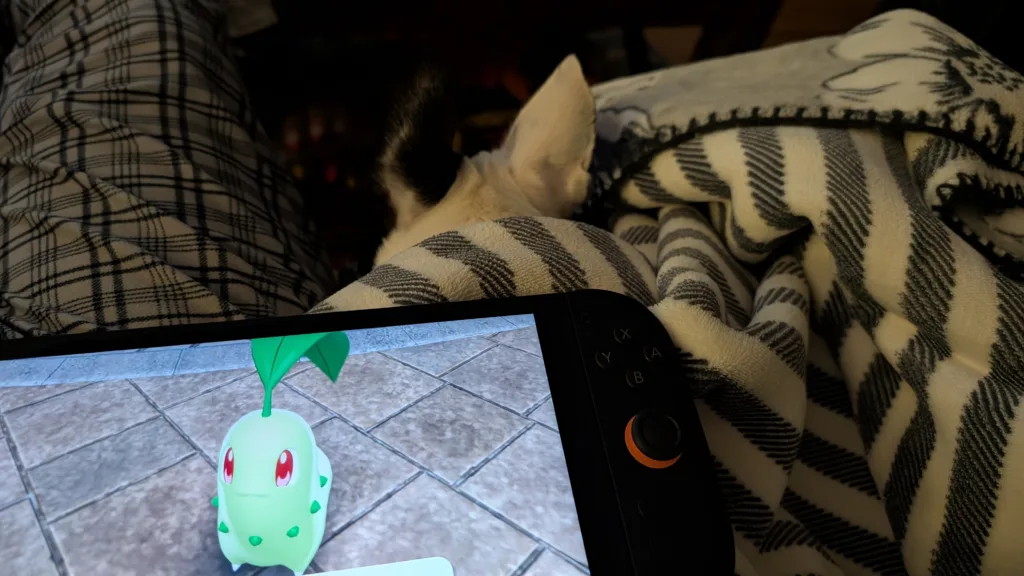 Pokémon Legends: Z-A being played on switch 2 in lap