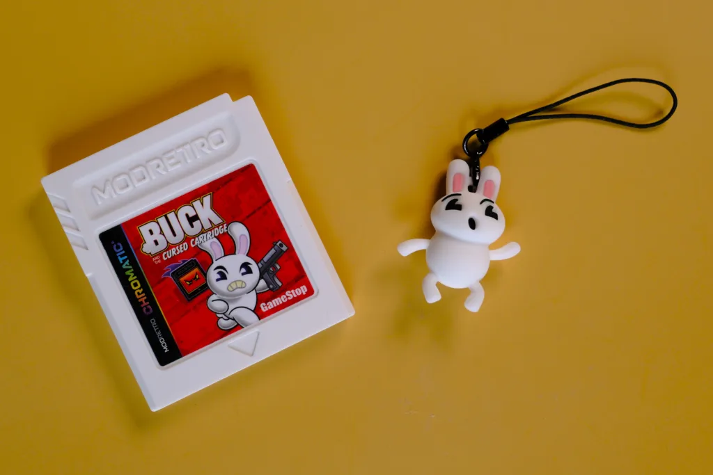 Buck and the Cursed Cartridge photo showing cart and charm