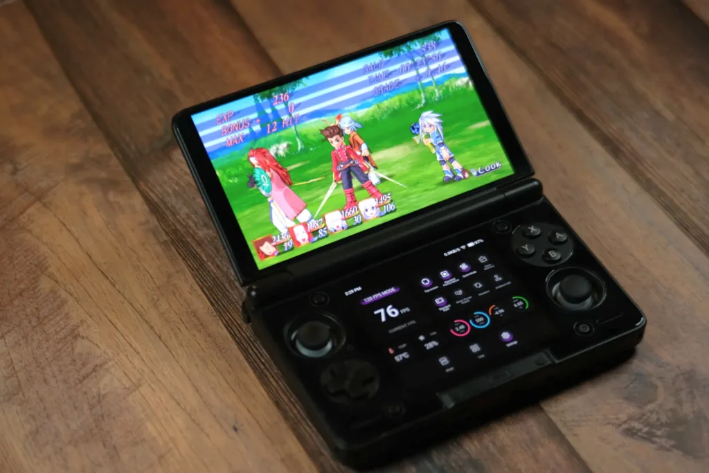 A picture of the Thor running Tales of Symphonia on the top screen, while having the AYN settings open on the bottom screen.