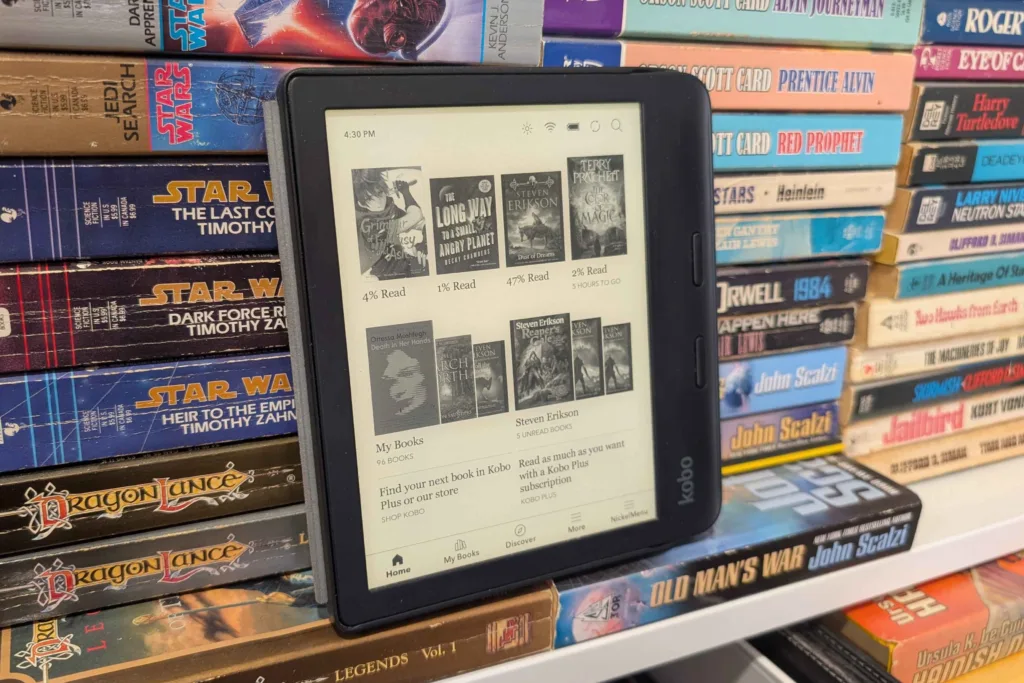 Kobo Libra 2 in front of books on shelf