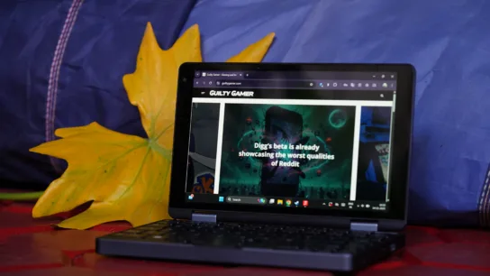 X-Plus Piccolo Netbook with lid open and colorful background