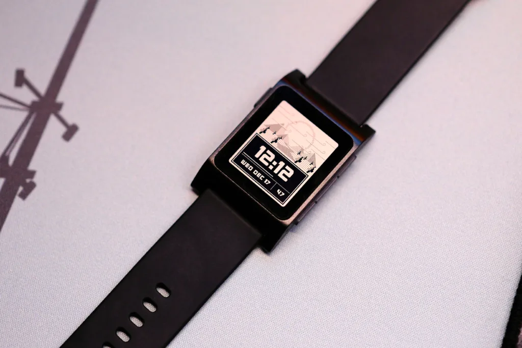 Pebble 2 Duo showing screen close with watch face and weather