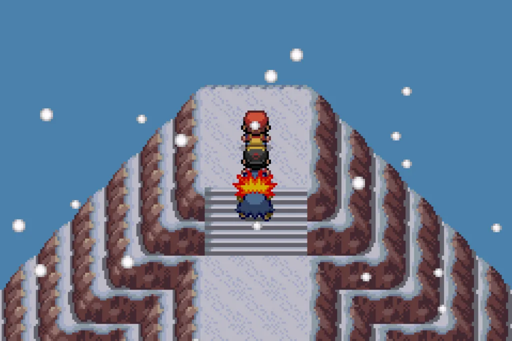 A picture of the player character approaching Red at the top of Mt. Silver.