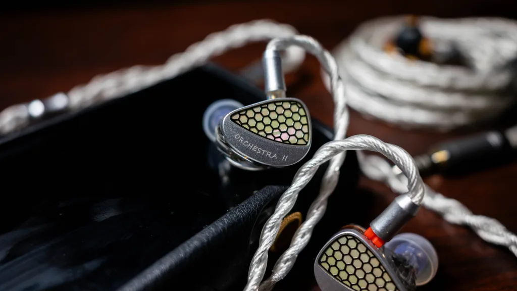 Kiwi Ears Orchestra 2 faceplate showcase on top of DAP