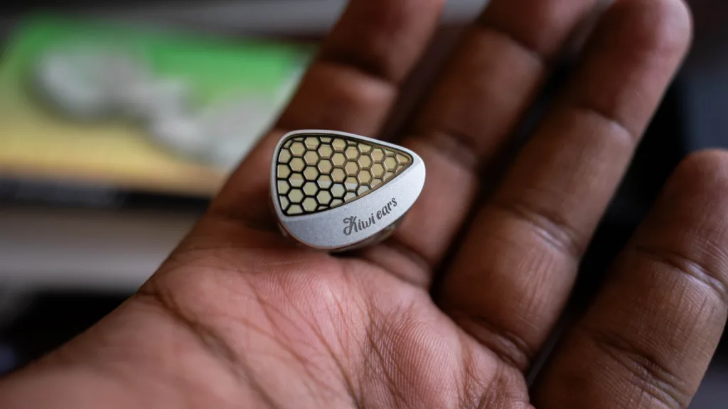 Kiwi Ears Orchestra 2 shell in hand with faceplate