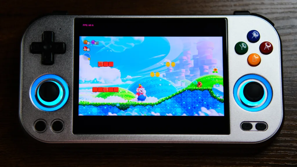 A picture of Super Mario Wonder running on the RG 477m. There's large black bars on the top and bottom of the screen.