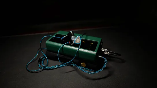 Symphonium Titan plugged into the iBasso PB5 Osprey stacked with the Shanling M9 Plus DAP