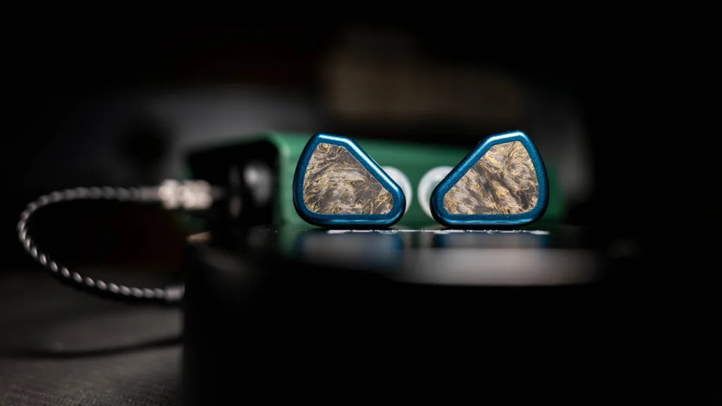 Symphonium Titan shells on top of its case