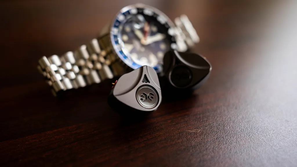 Apostle 2026 shells in front of a Seiko 5 GMT watch