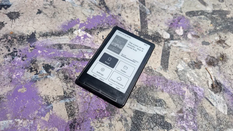 Xteink X3 on concrete with graffiti