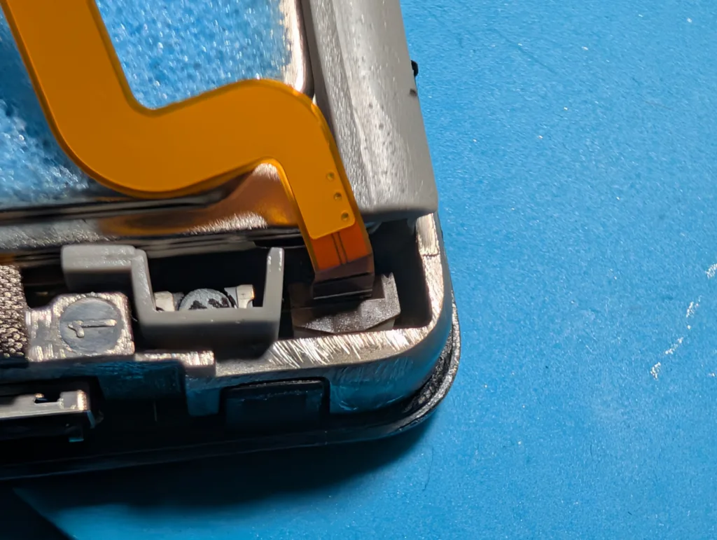 close up of battery ribbon cable of iPod Video